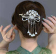 Crystal butterfly claw
