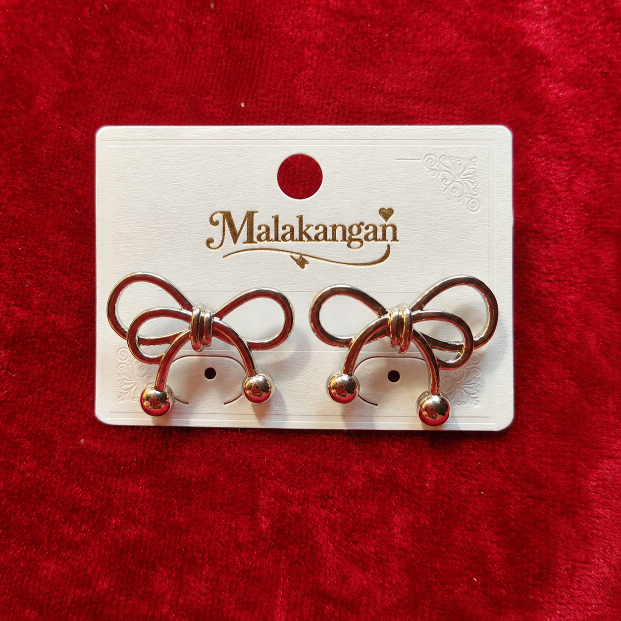 Bow Silver Studs